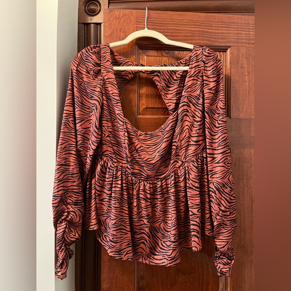 Free people zebra print top. Never worn! Size L